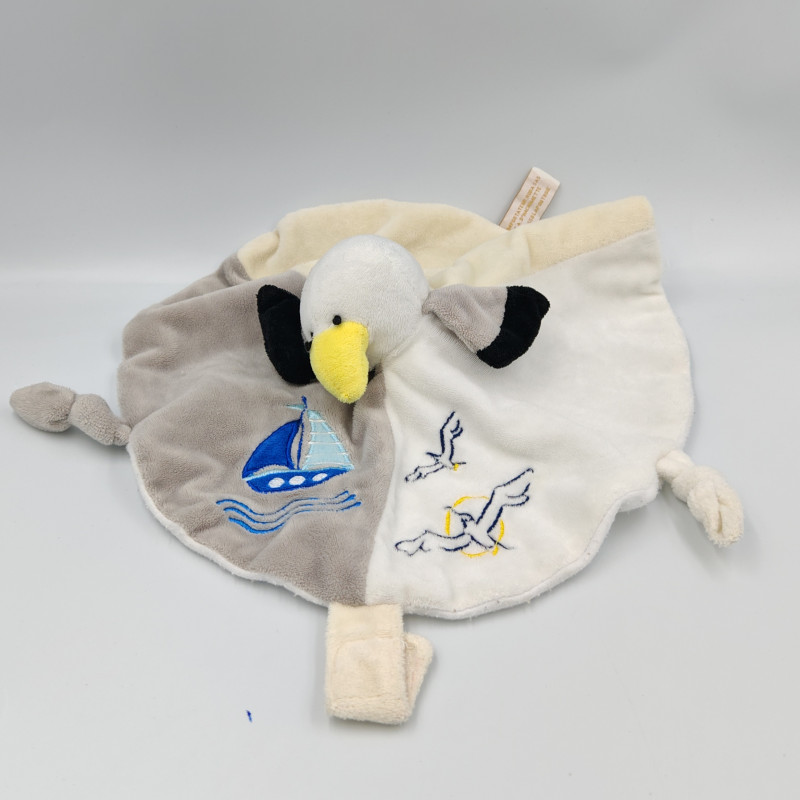 Doudou plat rond oiseau mouette grise blanche noir RODA