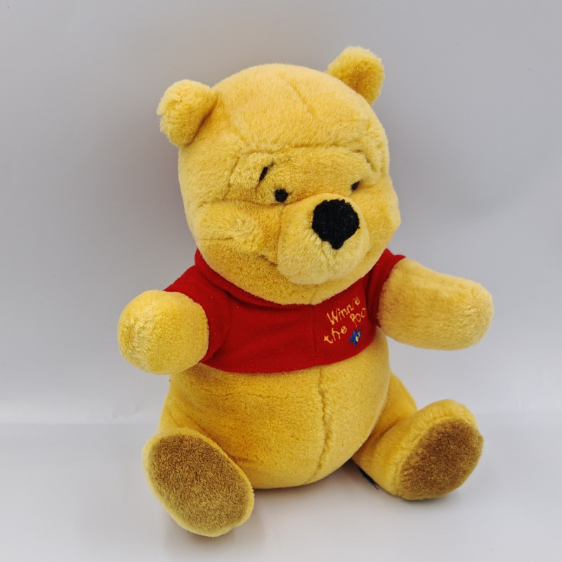 Peluche Winnie l'ourson pull rouge abeille Disney