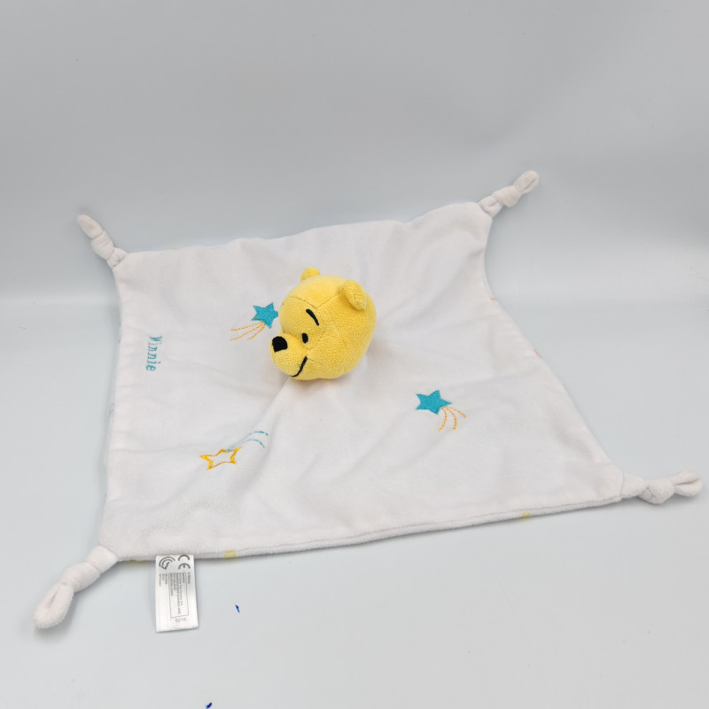 Doudou Plat Winnie blanc étoiles filantes bleu motifs Disney Nicotoy