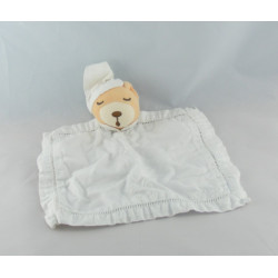 Doudou plat rond blanc ours dragée KALOO